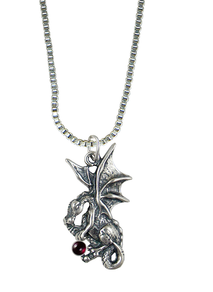 Sterling Silver Playful Dragon Pendant With Garnet